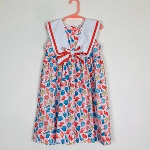 Smockingbird white orange and blue seashell print, sailor collar dress. 5
